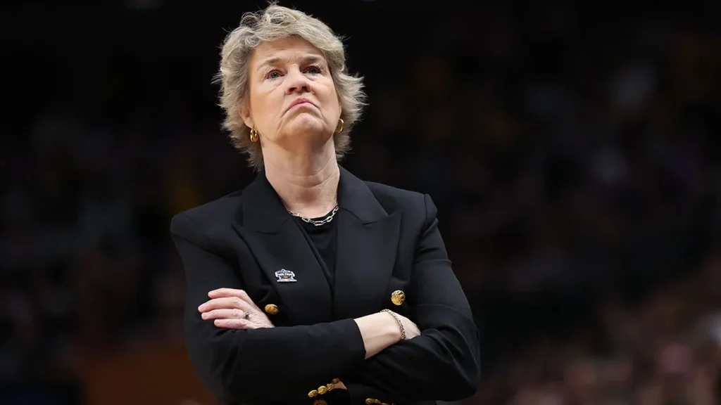 ESPN Iowa Hawkeyes basket ball head coach Lisa Bluder terminate her contract today because of….